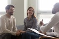 Happy couple, man and woman at reception with family therapist. Royalty Free Stock Photo