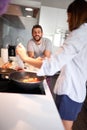 Happy couple in morning celebratin valentines day in kitchen. sexy and in love Royalty Free Stock Photo