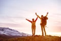 Happy couple mountains sunset sky Royalty Free Stock Photo