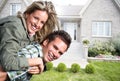 Happy couple near new house. Royalty Free Stock Photo