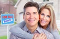 Happy couple near new house. Royalty Free Stock Photo