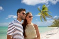 happy couple over tropical beach background Royalty Free Stock Photo