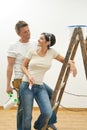 Happy couple painting first home Royalty Free Stock Photo