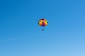 Happy couple Parasailing in Dominicana beach in summer. Couple under parachute hanging mid air. Having fun. Tropical Paradise. Pos Royalty Free Stock Photo