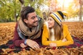 Happy couple at a park in autumn Royalty Free Stock Photo