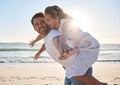 Happy, couple and piggyback walk on the beach for love, travel or summer vacation bonding together in the outdoors. Man Royalty Free Stock Photo