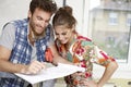 Happy couple planning a new home Royalty Free Stock Photo