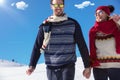 Happy couple playful together during winter holidays vacation outside in snow park Royalty Free Stock Photo