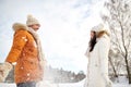 Happy couple playing with snow in winter Royalty Free Stock Photo