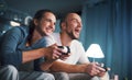 Happy couple playing video games at home Royalty Free Stock Photo