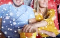 Happy couple with popcorn in movie theater Royalty Free Stock Photo