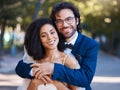 Happy, couple portrait and outdoor for wedding celebration event with a hug for commitment. Interracial man and woman at Royalty Free Stock Photo