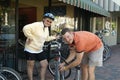 happy couple prepping their bikes for a ride