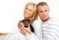 Happy couple with a puppy Royalty Free Stock Photo