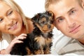 Happy couple with a puppy Royalty Free Stock Photo