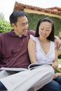 Happy Couple Reading Novel Royalty Free Stock Photo