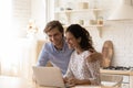 Happy couple relax at home using modern laptop Royalty Free Stock Photo