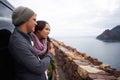 Happy couple, relax and road trip with natural view of ocean, beach or outdoor nature on holiday together. Young man or Royalty Free Stock Photo