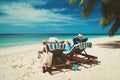 Happy couple relax on a tropical beach Royalty Free Stock Photo