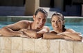 Happy Couple Relaxing In Swimming Pool Royalty Free Stock Photo