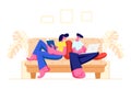 Couple Relaxing Together at Home Sitting on Sofa Royalty Free Stock Photo