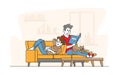 Happy Couple Relaxing Together at Home Sitting on Sofa with Book and Laptop. Male and Female Young Characters on Weekend Royalty Free Stock Photo