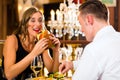 Happy couple in restaurant eat fast food Royalty Free Stock Photo