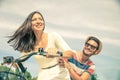 Happy couple riding bicycle outdoors Royalty Free Stock Photo