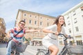 Happy couple riding bicycles outdoors Royalty Free Stock Photo