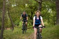 Happy couple riding bicycles outdoors Royalty Free Stock Photo