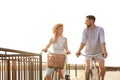 Happy couple riding bicycles outdoors Royalty Free Stock Photo