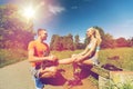 Happy couple with rollerblades outdoors Royalty Free Stock Photo