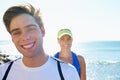 Happy couple, runners and portrait in beach, workout and fitness with smile, training and outdoor for run. Man, woman Royalty Free Stock Photo