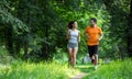 Happy couple running and jogging together Royalty Free Stock Photo