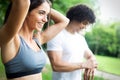 Happy couple running and jogging together outdoor Royalty Free Stock Photo