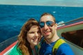 Happy couple sailing on a boat and taking selfie with smartphone Royalty Free Stock Photo