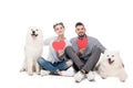 happy couple with samoyed dogs and paper hearts on white, valentines Royalty Free Stock Photo