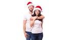 Happy couple with santa hat Royalty Free Stock Photo