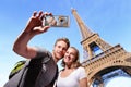 Happy couple selfie in Paris