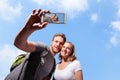 Happy couple selfie by smart phone