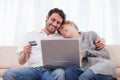 Happy couple shopping online Royalty Free Stock Photo