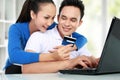 Happy couple shopping online Royalty Free Stock Photo