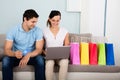 Happy Couple Shopping Online With Credit Card Royalty Free Stock Photo