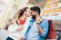 Couple shopping together for Valetine`s day and having fun Royalty Free Stock Photo