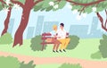 Happy couple sitting on bench in city park during romantic date in spring. Young man and woman holding hands spending Royalty Free Stock Photo