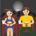 Happy couple sitting in movie theater, watching 3D movie, eating popcorn, smiling Royalty Free Stock Photo