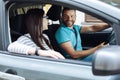 Happy couple sitting in their new car Royalty Free Stock Photo