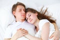 Happy couple sleeping in bed at home Royalty Free Stock Photo