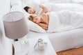 Happy couple sleeping in bed at home Royalty Free Stock Photo