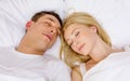 Happy couple sleeping in bed Royalty Free Stock Photo